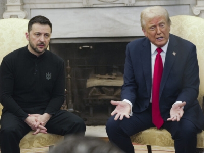 Ukrainian president Zelensky is seated next to President Trump