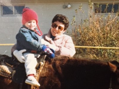 Justin Davidson as a toddler smiles as he rides a horse and his mom smiles and holds him on the saddle. For the first three years of Justin Davidson’s life, his mom, Mindy, spoke only Spanish to him. But then she stopped. When Davidson learned Spanish in middle school, it came very quickly to him, and over the years, he became bilingual. Now, he’s an associate professor in UC Berkeley’s Department of Spanish and Portuguese. Courtesy of Justin Davidson