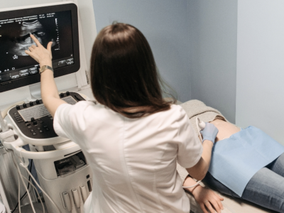 image of woman operating an ultrasound