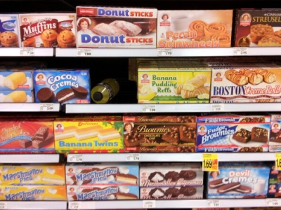 picture of ultra processed foods on a shelf 