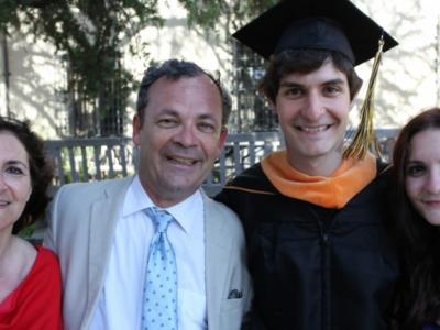 Thibault Duchemin, pictured here at commencement with his family, has designed a mobile app that offers real-time captioning for deaf users. Photo by Aaron Walburg