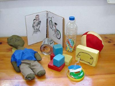 Toys and other items were used in home visits with parents and children in the Jamaican study. Photo by Susan Walker.