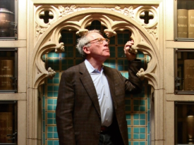Marcus Hanschen stands in an old European library