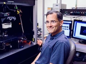 David Schaffer sitting in lab setting