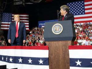 trump and hannity on stage