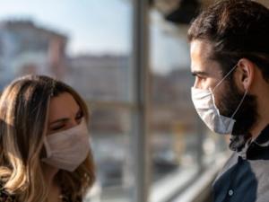couple wearing masks during coronavirus pandemic