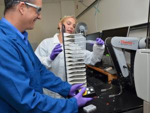 scientists in drug discovery center