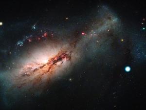 the supernova shown in the outer regions of its galaxy