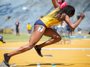 Cal Track and Field sprinter Ezinne Abba in a sprinting stance