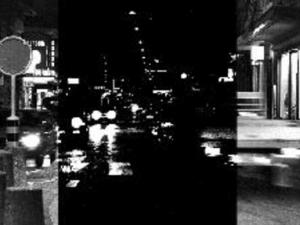 black and white nighttime images of an urban street