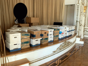 Dozens of bankers boxes, some possibly containing classified documents, stored on an unsecured Italianate stage at former President Donald Trump's Mar-a-Lago residence in Florida.