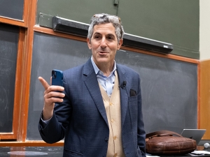 image of professor talking in front of class