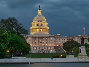 an image of the US Capitol in a stormy night 