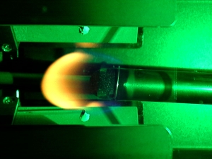 Flame spreading over a 12.7 mm sample at 19.8% oxygen under 60 kPa ambient pressure in microgravity. (Image courtesy of NASA)