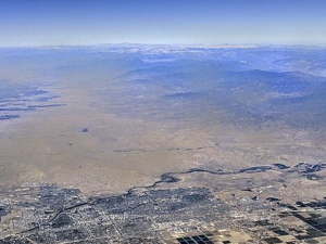 Aerial view of Bakersfield, California, and vicinity, showing the Kern River and the southern Sierra Nevadas