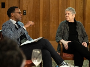 image of man and woman sitting in chairs talking to each other