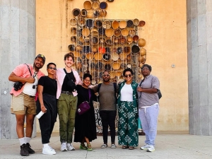 a group of people standing in front of a building