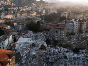 Collapsed concrete buildings in Antakya, Turkey, following the Kahramanmaraş earthquake sequence.