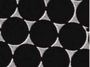 closeup of metal sheet with large holes