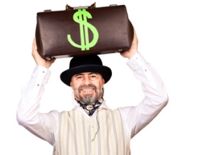 picture of man smiling holding bag on head with U.S. dollar sign on bag