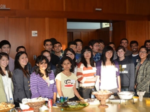 group shot of people surrounding a large table