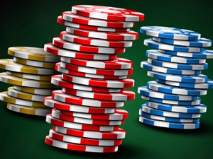 stacks of yellow, red and blue poker chips
